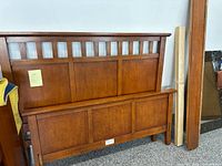 Front view of headboard and footboard leaning together