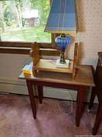Lamp, book rack and side table overview