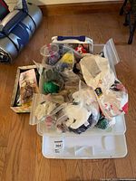 Tote with loose Beanie Babies in zip bags and storage tote