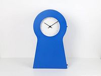 Front view showing full clock, face, color and shape