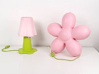 Table and wall lamps side by side showing full view, cords visible