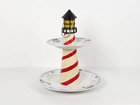 full view of two-tier lighthouse stand