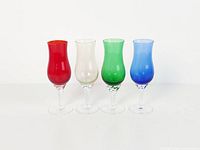 Full view of four multicolor crystal stem glasses