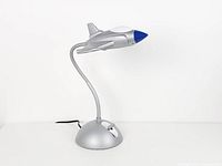 Full view of fighter jet lamp with flexible neck and base