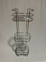 Front view of chrome 3-tier bathroom shelf