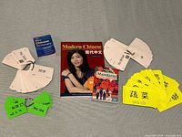 All items laid out: three books, two sets of flash cards