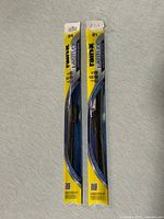 Both packaged RainX Latitude wiper blades side by side