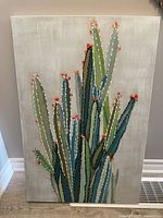 Front view of cactus canvas art showing full design and texture