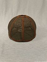 Front view of brown wicker petal lamp shade