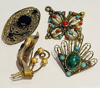 All four jewelry pieces group view