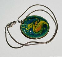 Entire necklace showing chain layout and pendant front