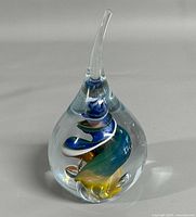 front view showing teardrop shape and internal swirl