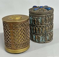 Both cylindrical boxes, side view