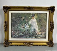 Front view showing complete framed print with ornate gold frame and mat