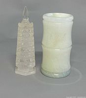 Front view of jade vase and quartz pagoda side by side