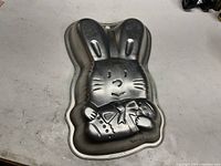 Front view of the formed aluminum Easter Bunny cake pan