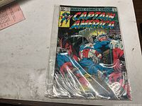 Front cover of bagged Captain America #272 comic