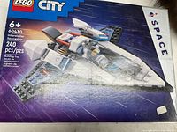 Front of sealed LEGO City 60430 Interstellar Spaceship box showing artwork, piece count and age rating.