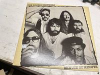 Front album cover with band portrait