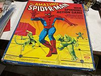 Box lid showing title and artwork