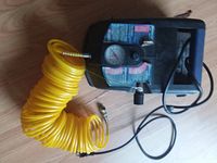 Top view showing compressor, gauge, yellow hose