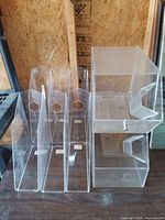 Group shot showing six magazine holders and two stackable bins