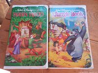 Front covers of both VHS tapes showing titles and artwork
