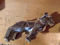 Top view of chrome Mack bulldog hood ornament
