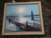 Front view of framed oil painting showing full winter landscape