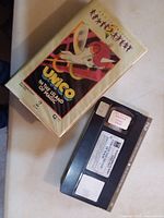 Front of clamshell case and VHS cassette