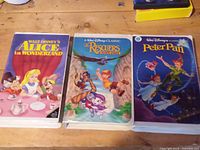 Front covers of the three Disney VHS tapes
