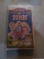 Front view of sealed Disney Dumbo VHS showing title, artwork, shrink wrap