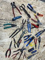 Overview of all hand tools spread on work surface