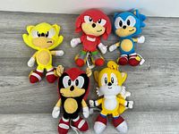 Group view of all five Sonic series plush toys on floor