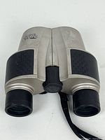 angled top view displaying focus knob and grip texture