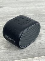 Front angled view showing grille and SONY branding
