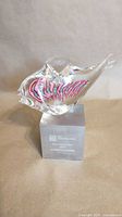 full view of glass fish award showing fish and base