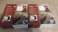 Two boxed Nexxt Alma tealight holders front view