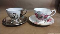 Two teacup and saucer sets side-by-side showing overall designs