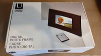 Retail box showing Umbra Digicurve digital photo frame image and branding