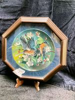 Octagonal framed Bradford Exchange collector plate depicting two songbirds on blossoming branch