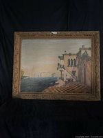 Front view of framed Venetian canal oil painting in ornate gold frame