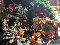 Group of five assorted wreaths showing different themes and materials