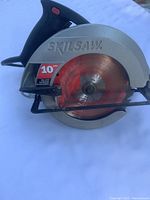 Left side view of Skilsaw 5150 circular saw showing branding, blade size label, and blade
