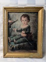 Front view of framed child portrait print
