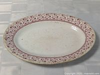 Full view of oval platter showing border pattern