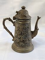 Full view of miniature teapot right side