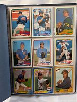 Binder page with nine 1989 Topps cards including John Dopson and Pat Borders