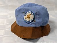 Front view of Beavers Canada bucket hat showing badge and two-tone design