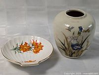 Ginger jar beside shell dish showing size and decoration